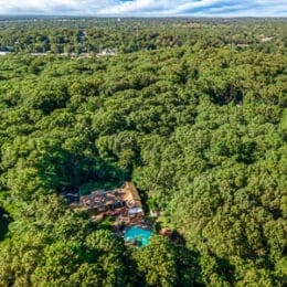 Drone aerial shot of a Long Island property and its surrounding neighborhood